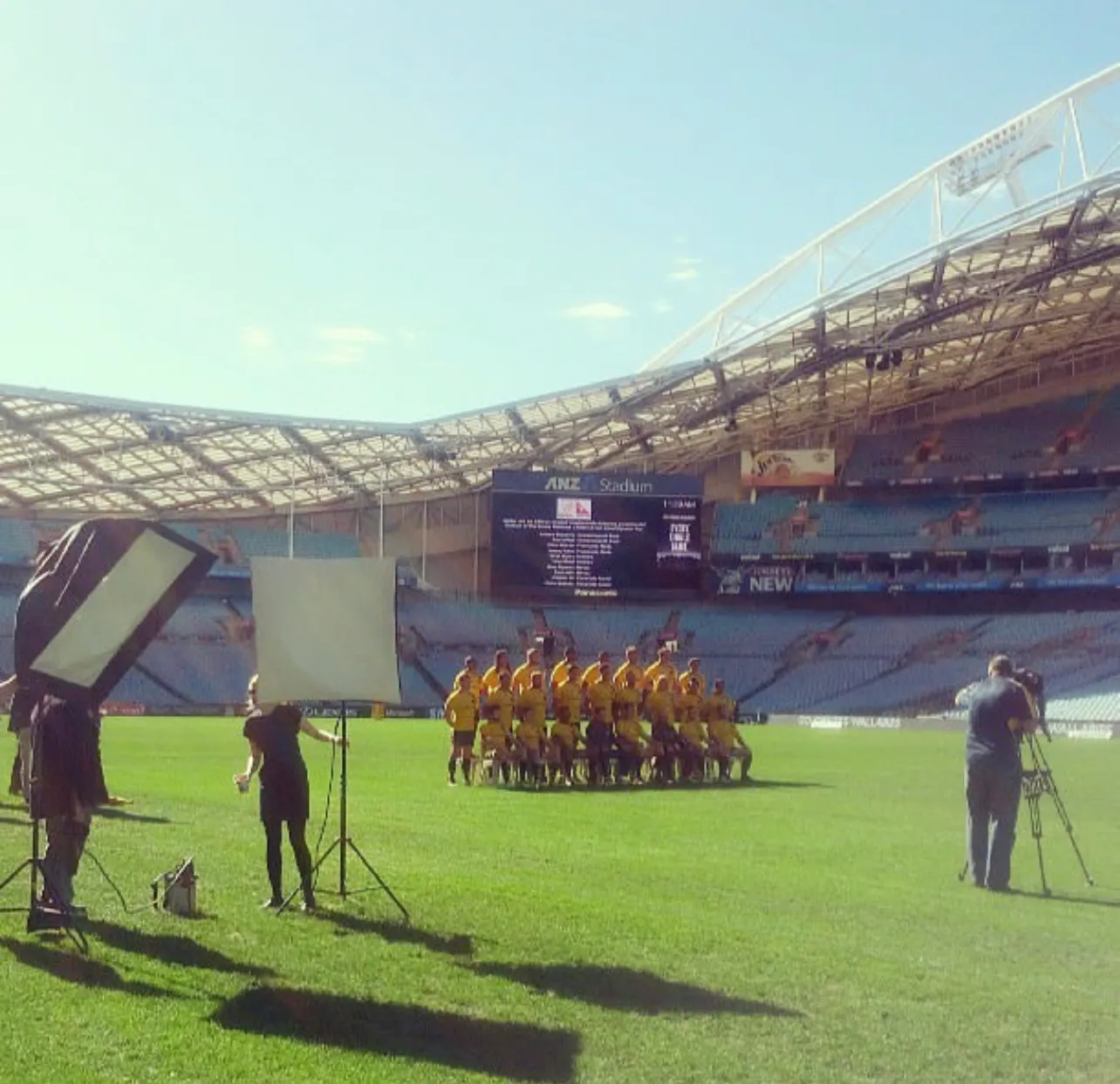 Rugby team filming at stadium