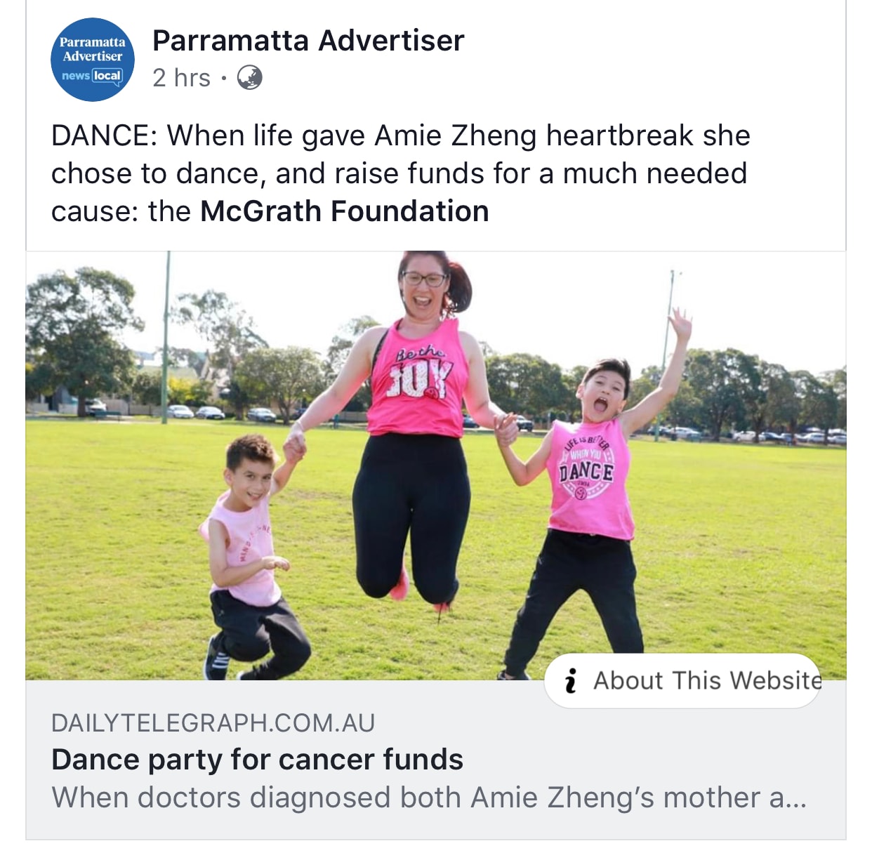 Woman and children dancing at park fundraiser
